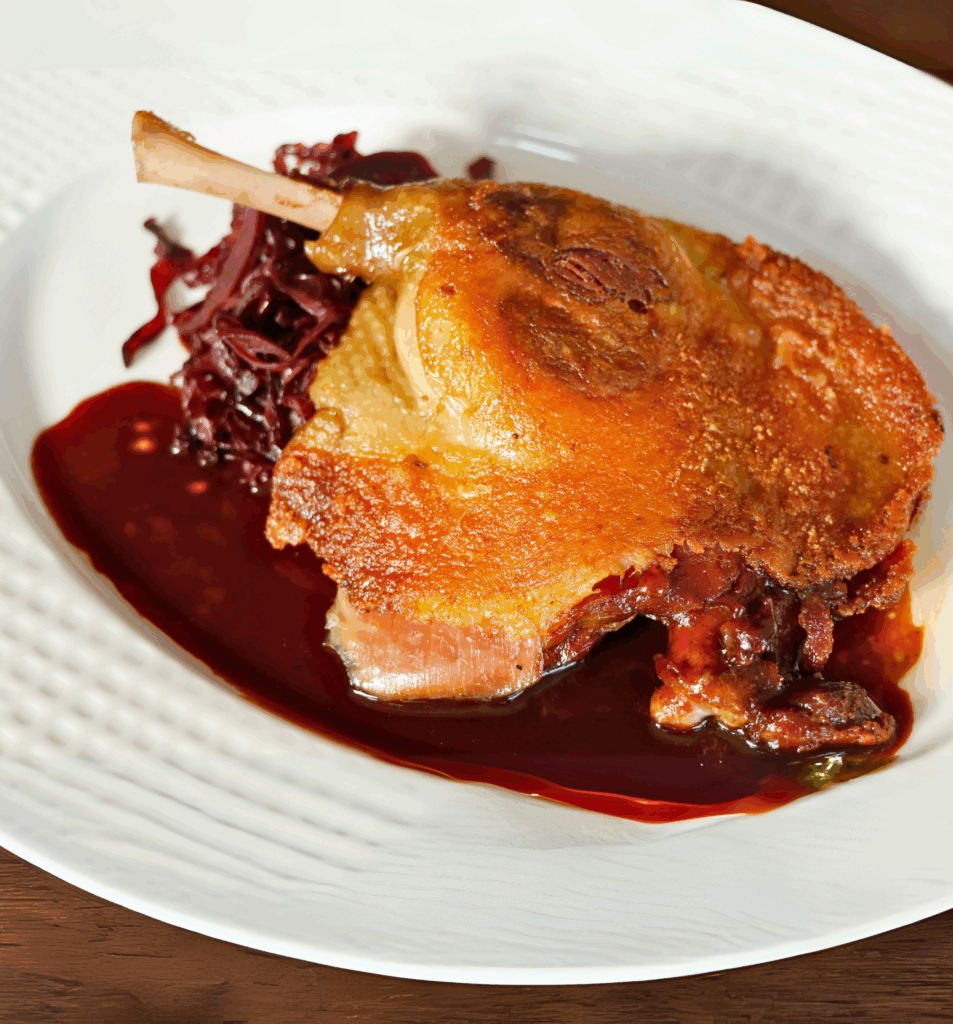 Duck Confit on top of pickled cabbage