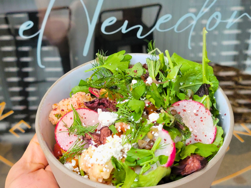 Herbs and fresh vegetables in a bowl
